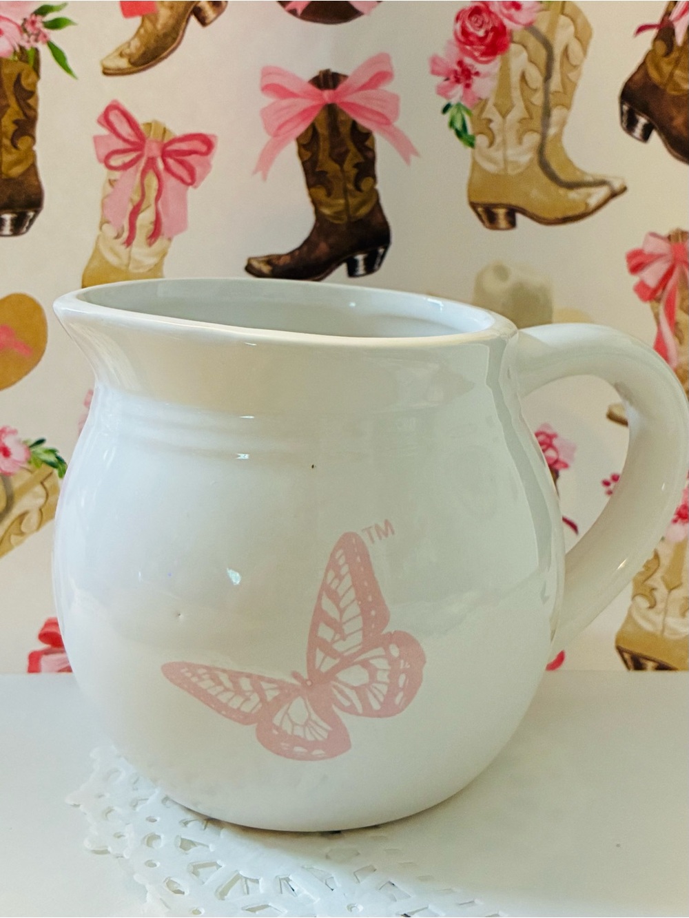 Dolly Parton Creamer NEW Dolly Parton butterfly creamer minor chip. Never used